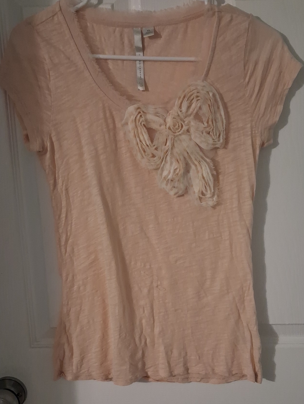 LC Lauren Conrad Peach Short Sleeve Top with Floral Rosette Detail